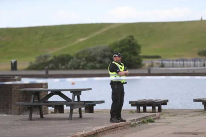 Crowds had gathered at the Irvine beach when the teenager was stabbed (Picture: Stephen Gibson / Buchanan Photos)