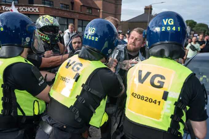 Unrest in Essex: anti-migrant protests escalate into attacks on police