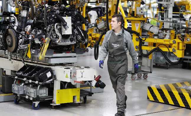 UK manufacturing nears end of downturn as output and optimism rise, PMI shows