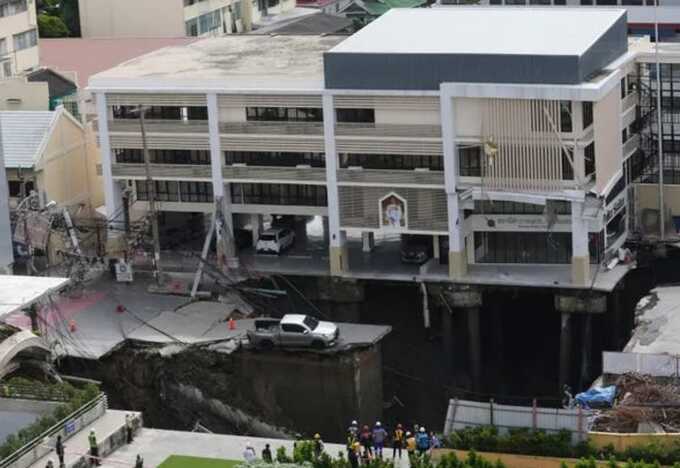Large sinkhole forms as road collapses in Bangkok