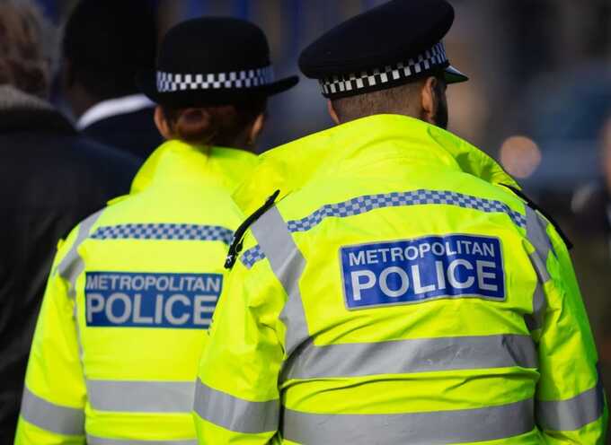 Body found after skull discovered hanging from tree in north London