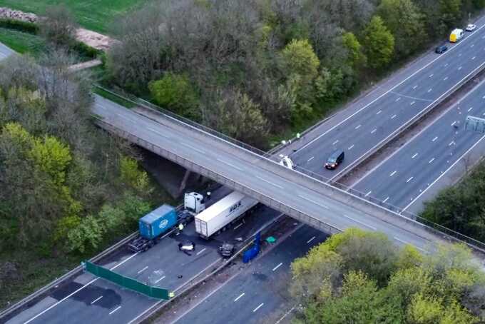 Two teenagers killed after car falls from bridge onto M1 and hits minibus