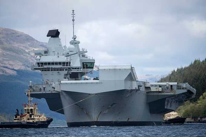 Britain’s £3.5bn aircraft carrier breaks down again as defence funding row deepens