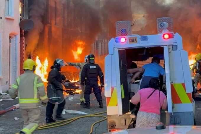 Belfast stabbing unrest: residents evacuated as homes burn during violent protests