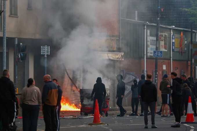 Belfast stabbing victim’s family condemn riots after homes torched in migrant attacks