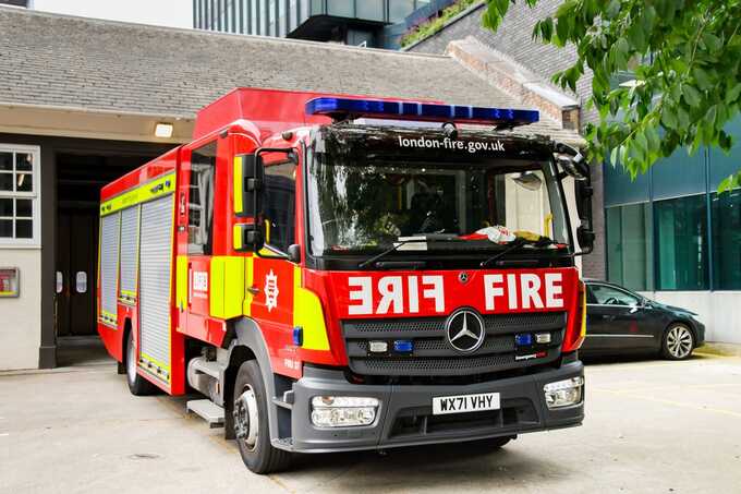 Three men die after fire tears through White City pavilion