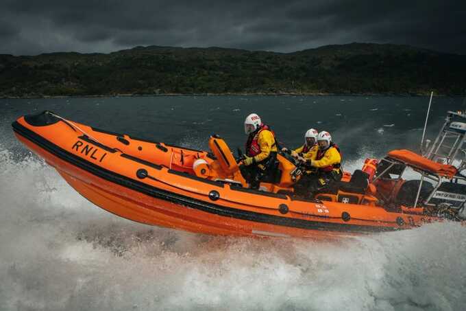 Teenager praised after sailing out to rescue two men from inflatable toy boat