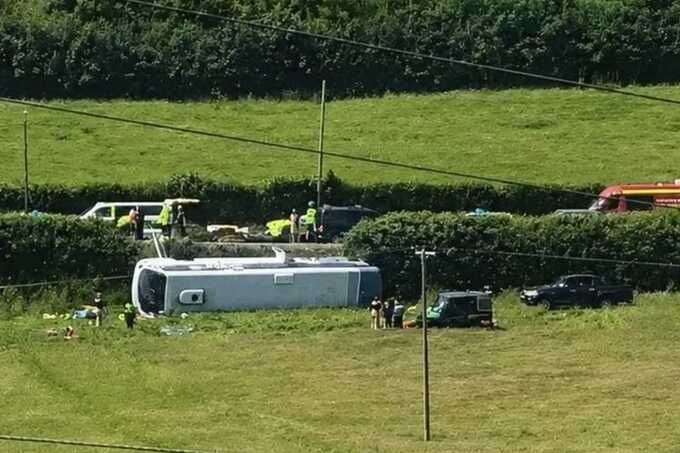 Bus overturns in horror crash leaving at least 26 injured