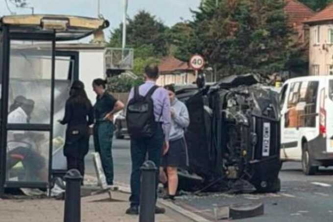 Two injured after car ploughs into bus stop during London rush hour