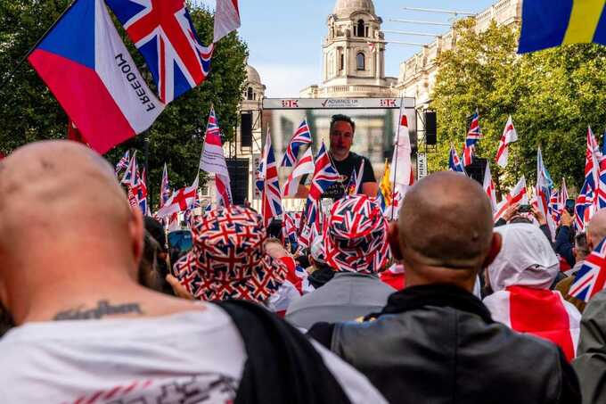 Elon Musk amplified Tommy Robinson speech hosted by group with alleged neo-Nazi links
