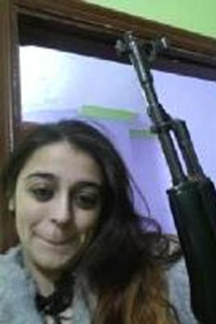 Tareena with an AK47