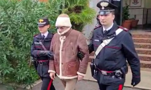 Matteo Messina Denaro the country&rsquo;s most wanted mafia boss being escorted out of a Carabinieri police station after he was arrested in Palermo, Italy in 2023. A THIRD PARTY./File Photo