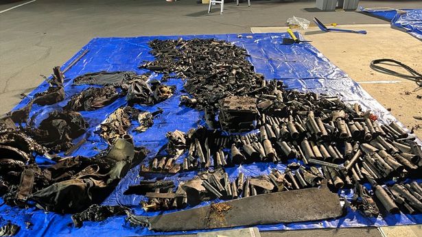The charred contents of the Cybertruck were laid out by cops as they investigate the explosion dqxikeidqkikdinv