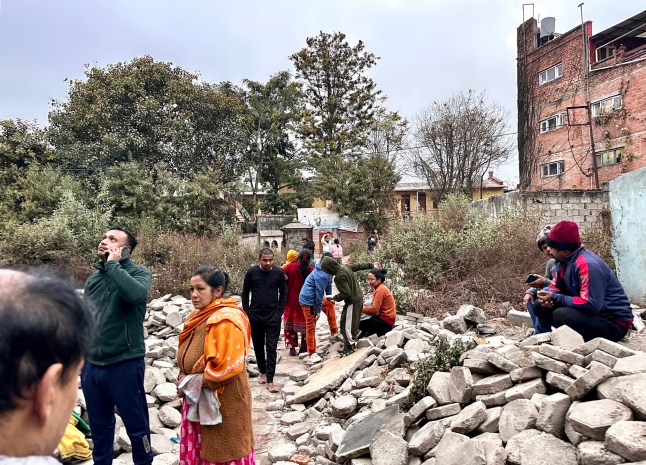 People gather in an open area following earthquake tremors in Kathmandu, in the early hours on January 7, 2025. A powerful earthquake in China&rsquo;s remote Tibet region killed at least 32 people and collapsed 