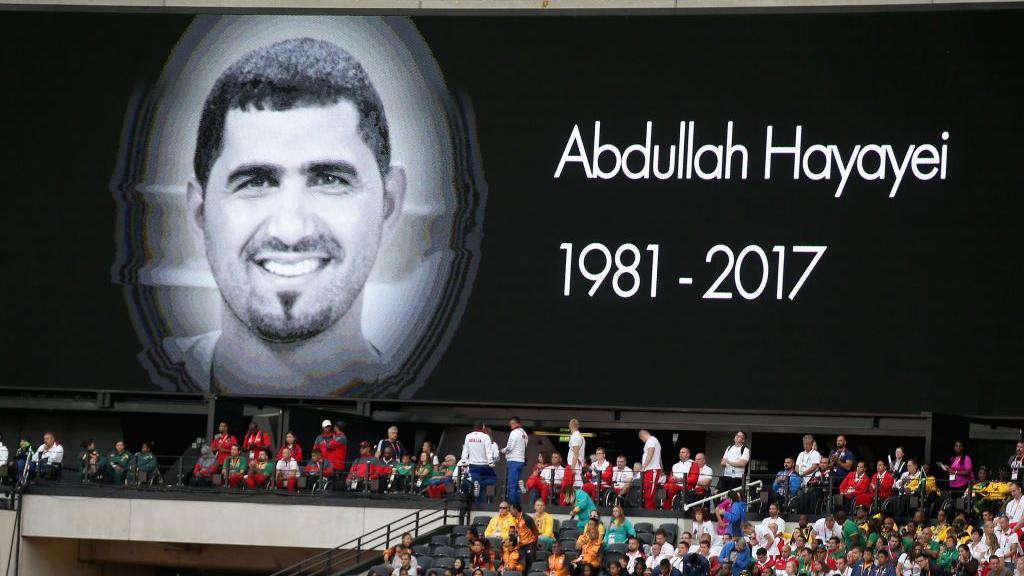 A board showing the face of Abdullah Hayayei  dqxikeidqkikdinv