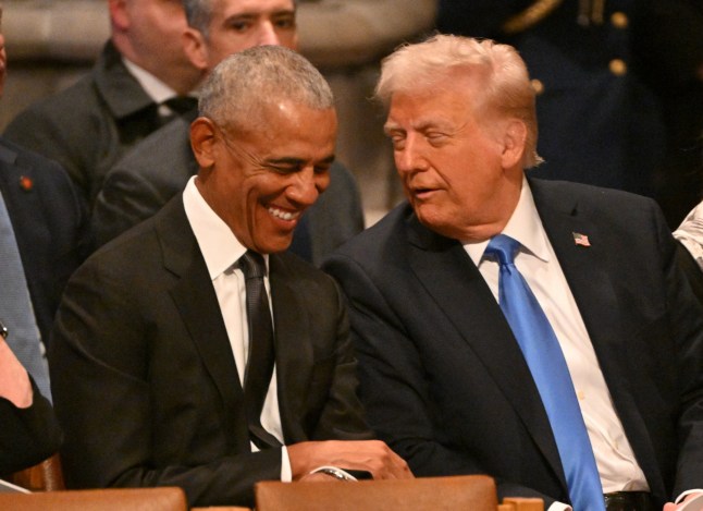 Former US President Barack Obama speaks with President-elect Donald Trump before the State Funeral Service for former US President Jimmy Carter at the Washington National Cathedral in Washington, DC, on January 9, 2025. (Photo by ROBERTO SCHMIDT / AFP) (Photo by ROBERTO SCHMIDT/AFP via Getty Images) dqxikeidqkikdinv