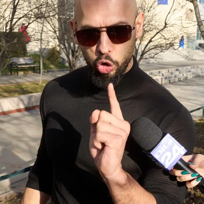 Andrew Tate must remain in Romania despite being released from house arrest. dqxikeidqkikdinv