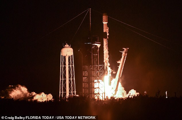 A SpaceX rocket carrying 23 Starlink satellites takes off from Kennedy Space Center on January 28