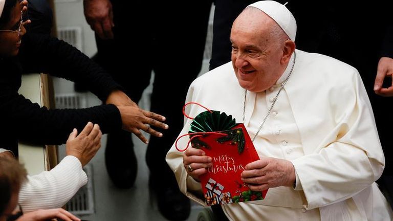 Pope Francis presides over Christmas Eve mass at the Vatican, starting with the Opening of the Holy Door
 dqxikeidqkikdinv