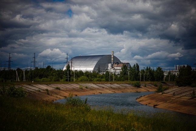 (FILES) A photograph shows the New Safe Confinement at Chernobyl Nuclear Power Plant which cover the number 4 reactor unit on May 29, 2022, amid the Russian invasion of Ukraine. Ukraine&rsquo;s President Volodymyr Zelensky said on February 14. 2025 that a Russian drone had struck a cover built to contain radiation at the Chernobyl nuclear power plant, adding that 
