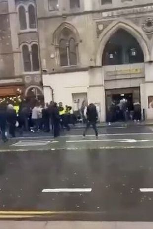 a mob walking through cardiff