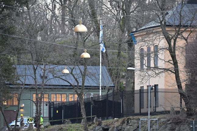 A police car is seen outside the Israeli embassy in Stockholm, January 31, 2024. A hand grenade was found near the Israeli embassy in Stockholm, Sweden on Wednesday, the explosive device was destroyed by the National Bomb Squad. (Photo by Henrik Montgomery/TT / TT News Agency / AFP) / Sweden OUT (Photo by HENRIK MONTGOMERY/TT/TT News Agency/AFP via Getty Images) dqxikeidqkikdinv