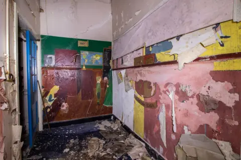 Urbandoned Murals on the old school corridors, photographed before the fire damage